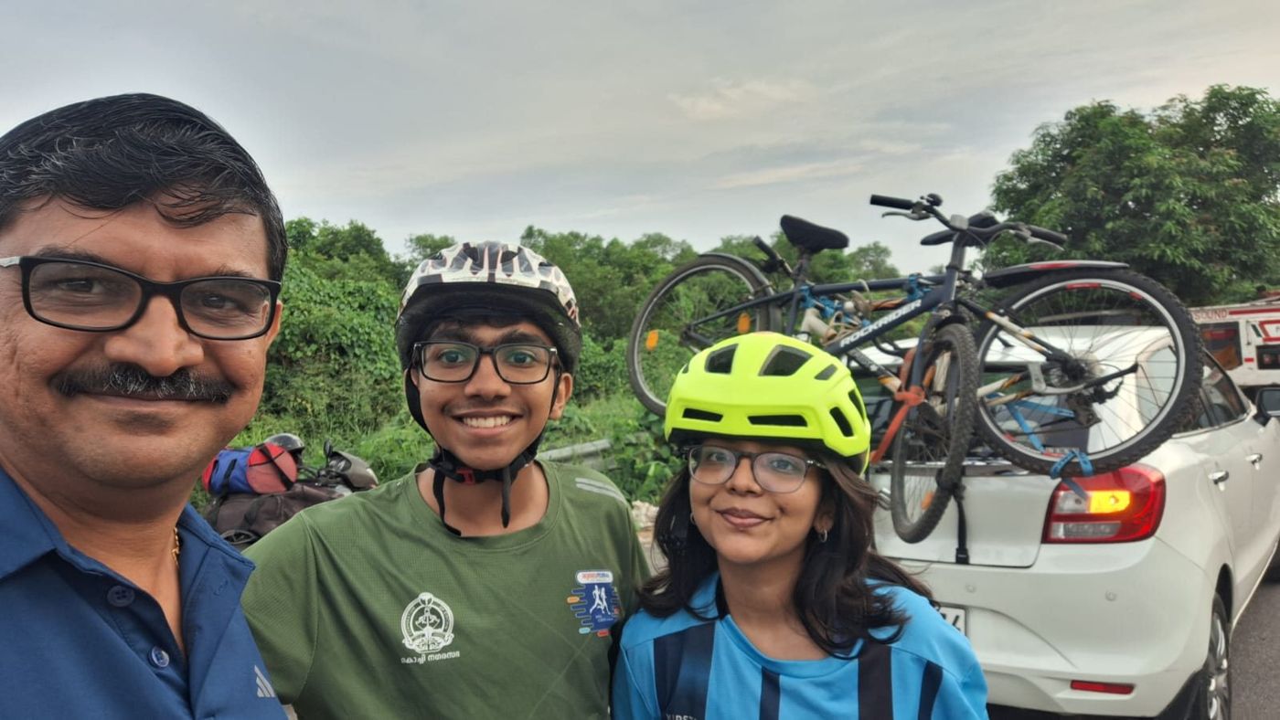 Bipin with family members in cycling helmets