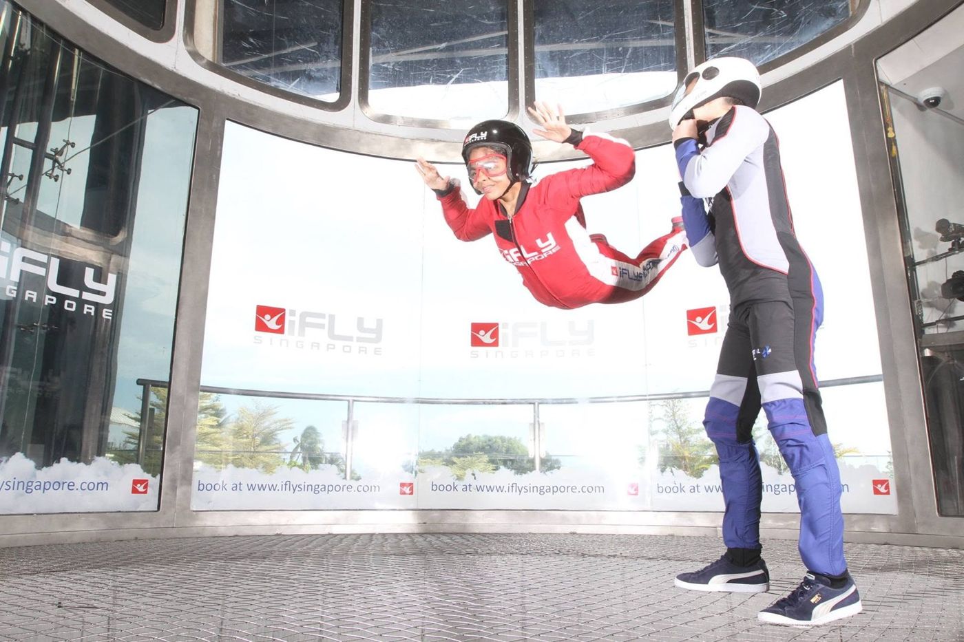 Maria in an indoor skydiving tunnel