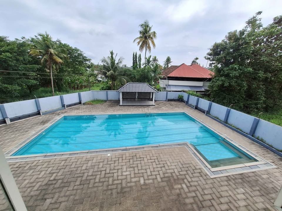 The community swimming pool with a gazebo
