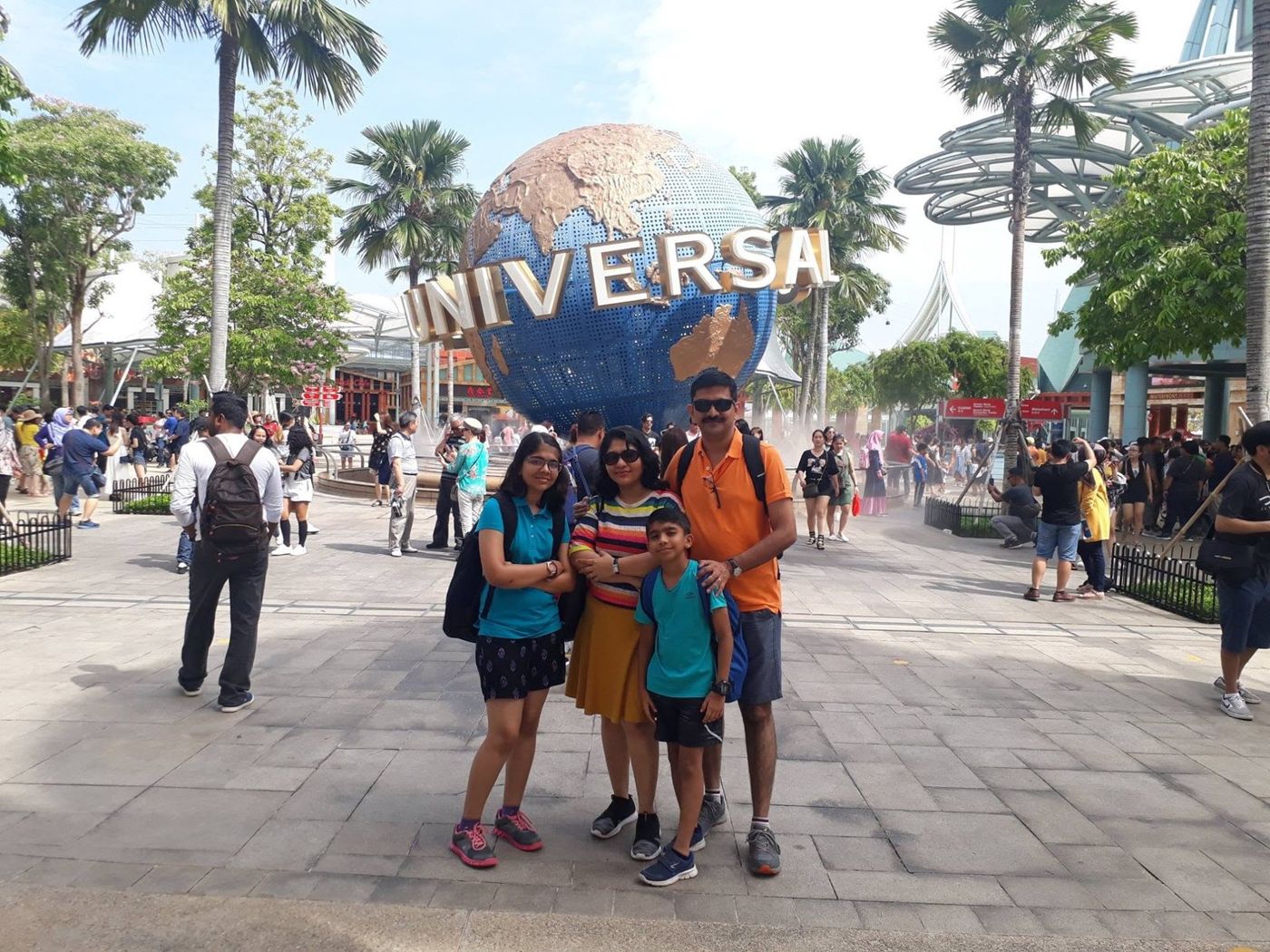 The family at the Universal Studios globe, Singapore